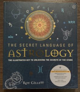 The cover of a book: The Secret Language of Astrology by Roy Gillett